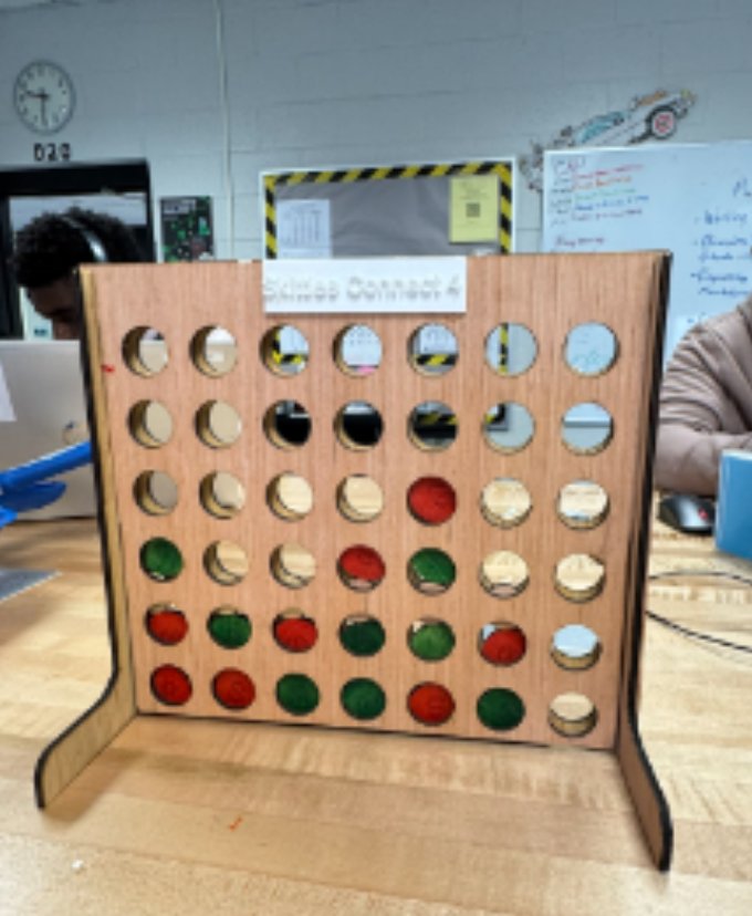 Laser-cut wooden Connect Four game board built by a student