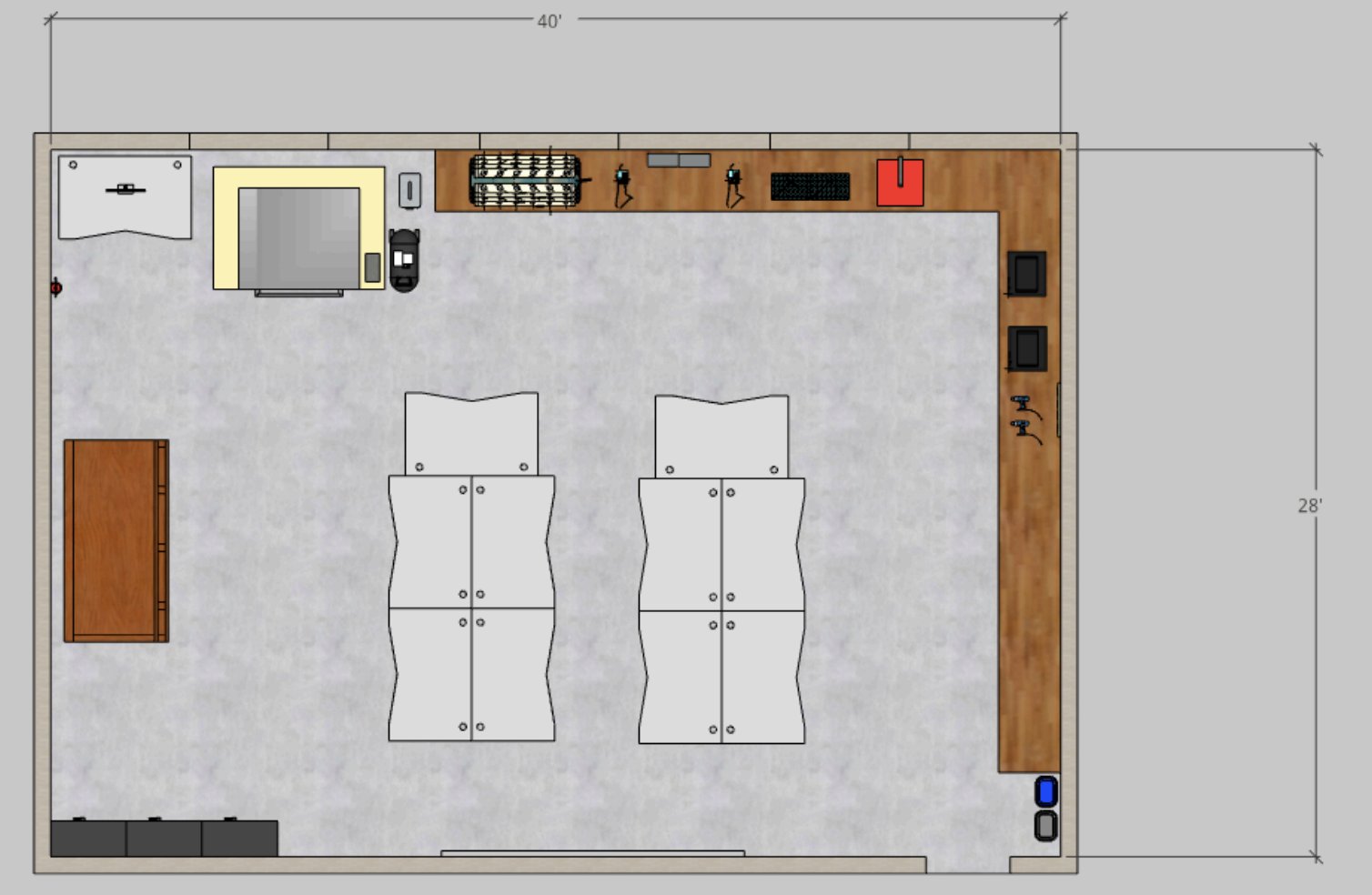 CAD floor plan of the planned lab layout, showing pod desks, a workbench, and storage cabinets