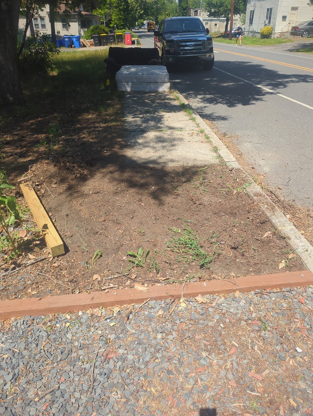 Lumber staged for building a new front walkway