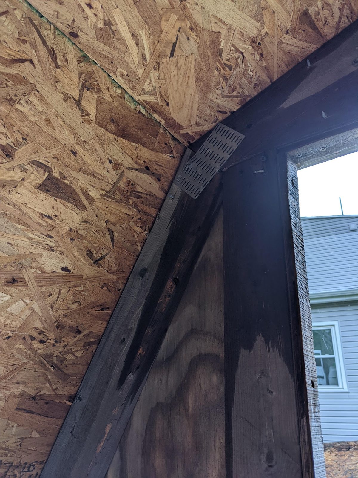 Close-up of the roof deck sheathing along the eave